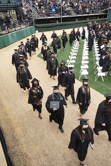 Students march out after 2021 Commencement